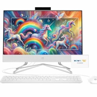 Colorful computer setup with unicorn artwork on the screen.