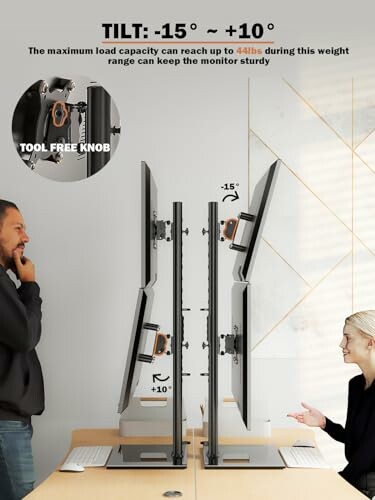 Two people demonstrating dual monitor tilt adjustment with tool-free knob.