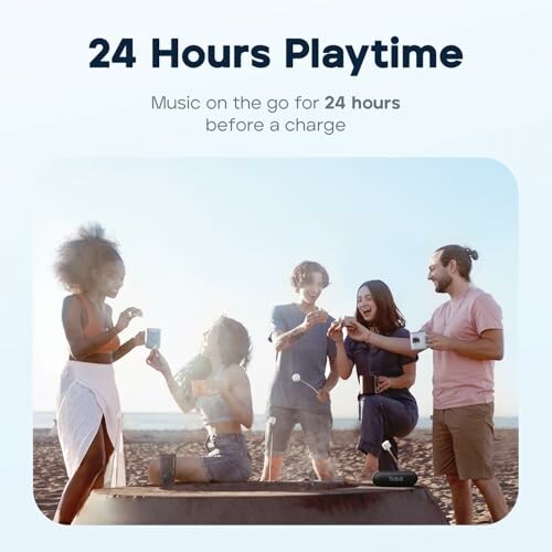 Group of people enjoying music outdoors with portable speaker
