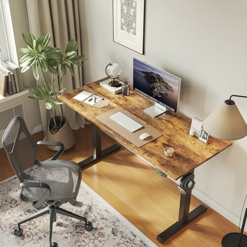 Modern home office with wooden desk, computer, and chair.