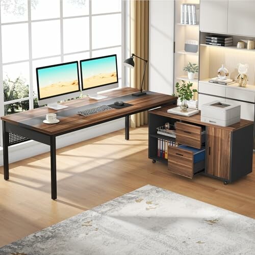 Modern office desk with dual monitors and storage cabinet.