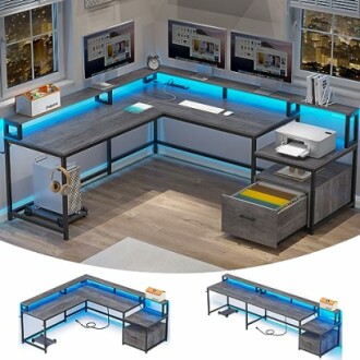 Modern L-shaped desk with dual monitors and LED lighting.