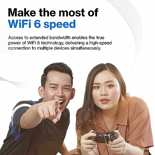 Two people gaming, highlighting WiFi 6 speed benefits.